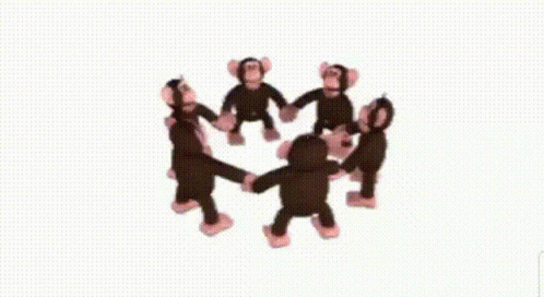 a gif of a bunch of monkeys holding hands and spinning really fast
